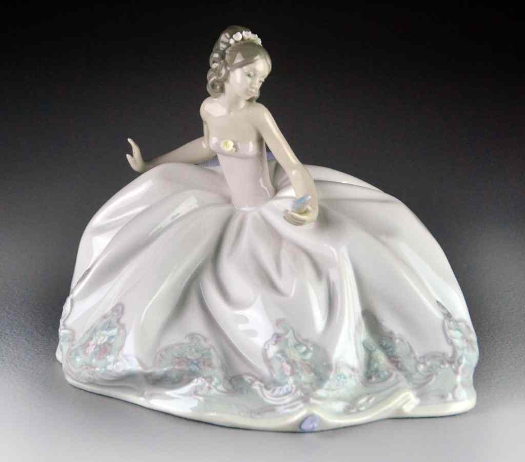 Appraisal: Lladro Porcelain Figurine ''Belle of the Ball''Depicting a beautiful young