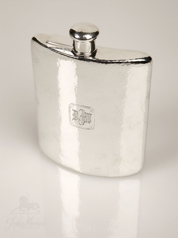 Appraisal: A Tiffany Co hammered sterling flask A Tiffany Co hammered