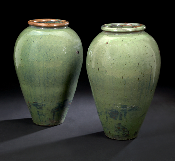 Appraisal: Large Pair of Chinese Green-Glazed Storage Jars the bodies tapering