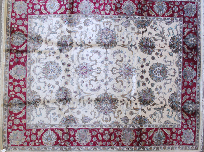 Appraisal: HAND KNOTTED ORIENTAL CARPET Indo-Persian synthetic silk overall Isfahan floral