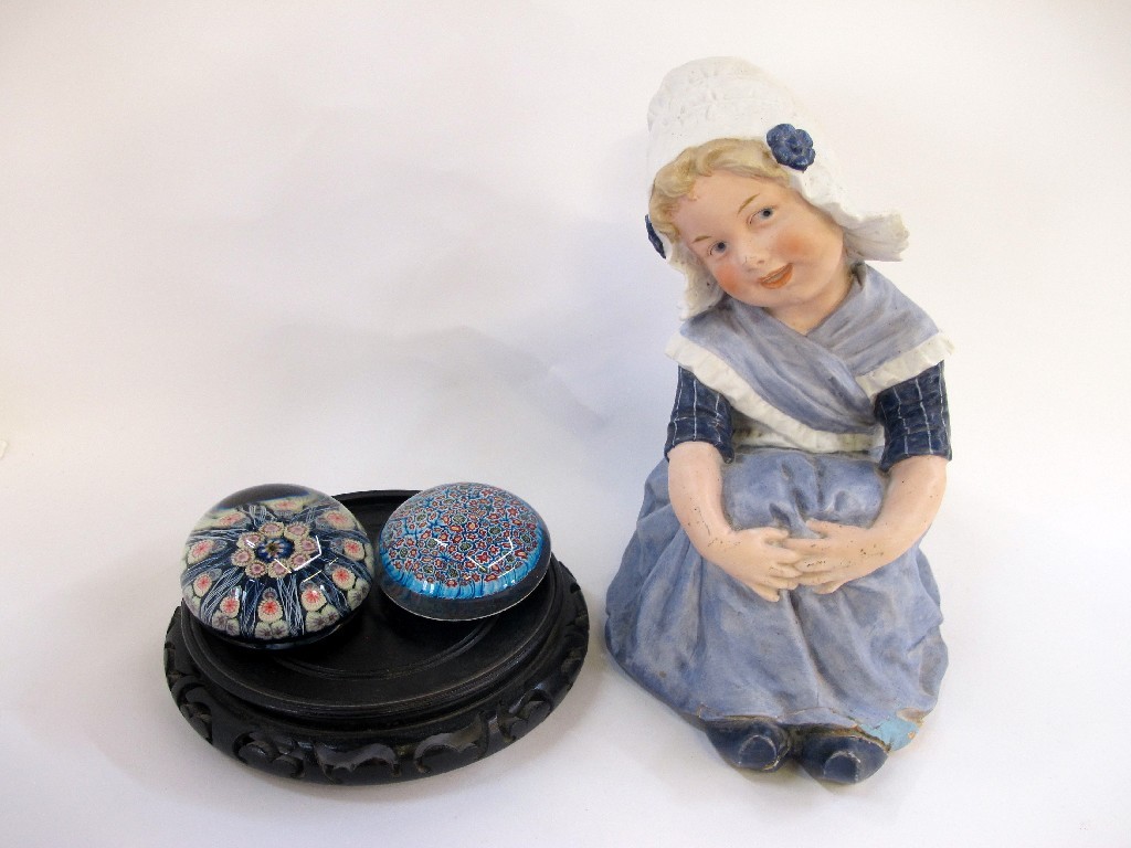 Appraisal: Gebruder Heubach large Dutch girl figure def two paperweights with