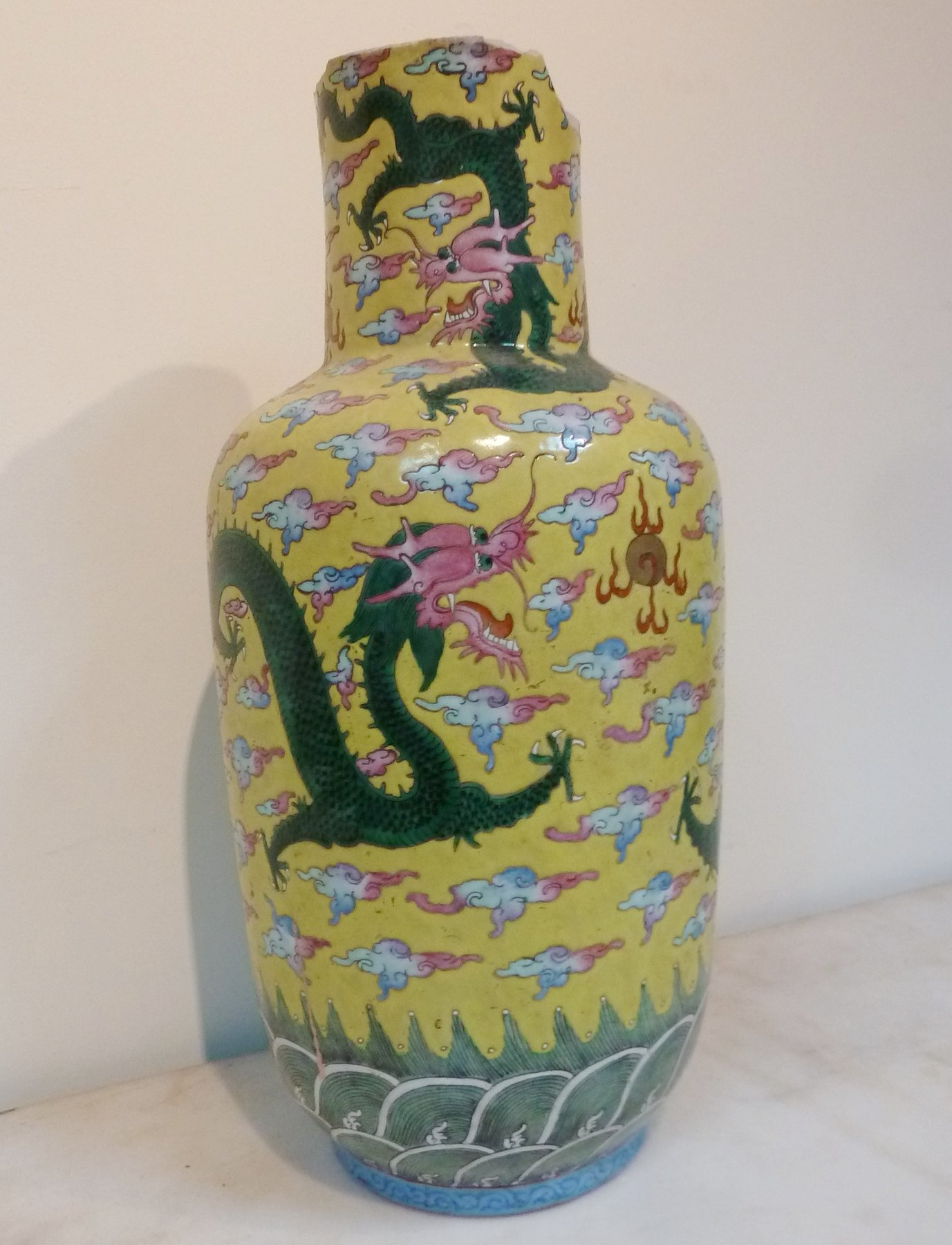 Appraisal: A Chinese yellow ground vase decorated with dragons damaged Provenance