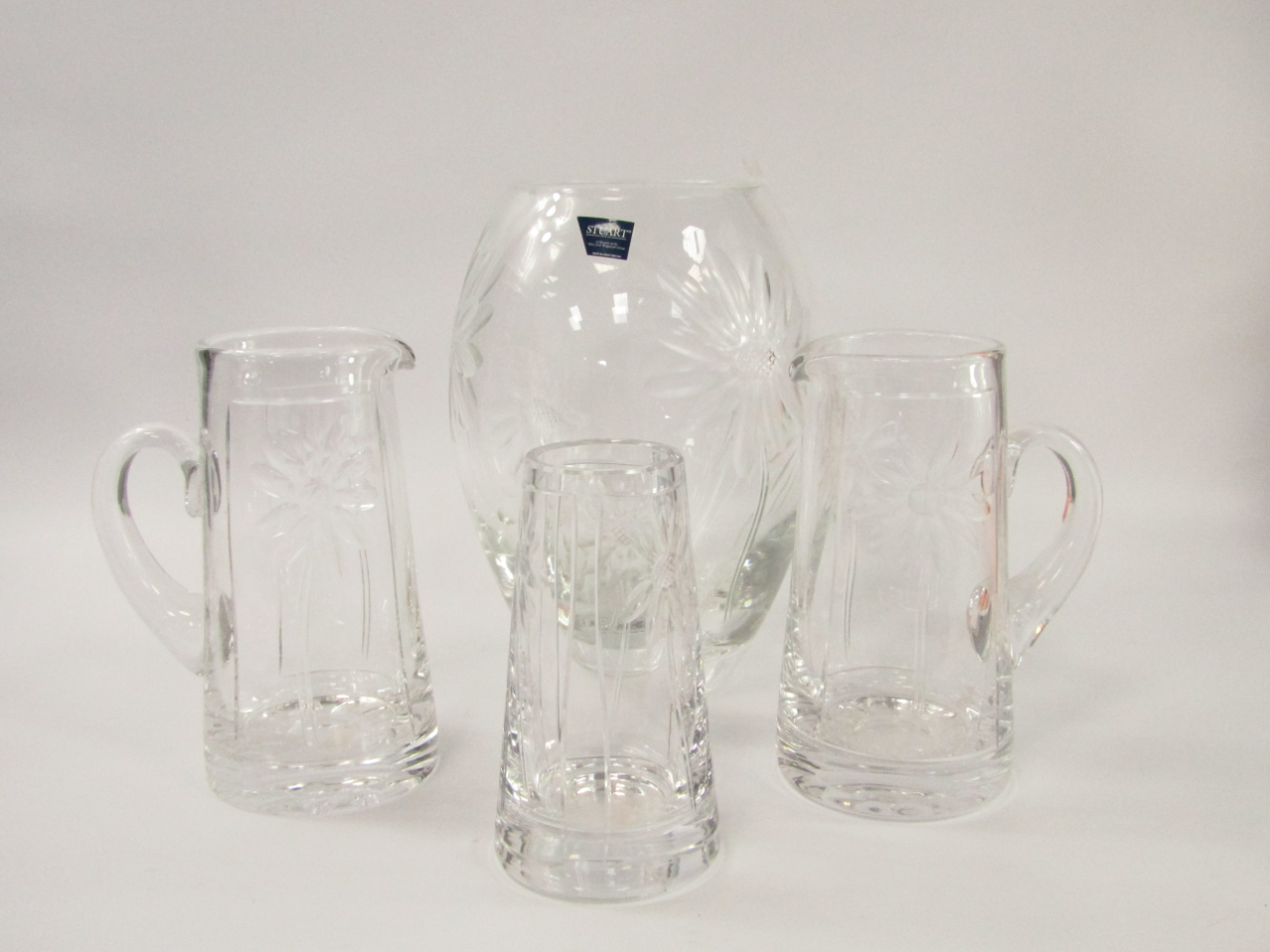 Appraisal: Stuart Crystal decorated in the Daisy pattern comprising three water