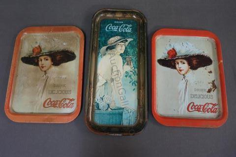 Appraisal: Coca-Cola 's Reissue Ladies Tin Trays Early 's Coca Cola