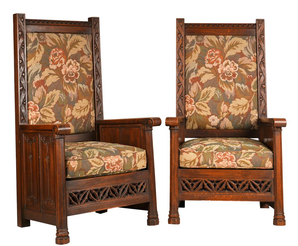 Appraisal: PAIR GOTHIC-STYLE CARVED OAK HALL CHAIRSwith paneled sides inches wide