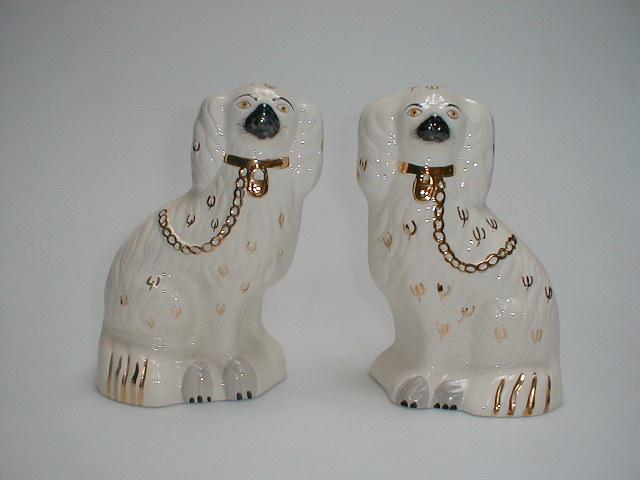 Appraisal: A pair of Royal Doulton pottery seated spaniels with black