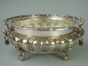 Appraisal: A German white metal circular fruit bowl of squat bulbous