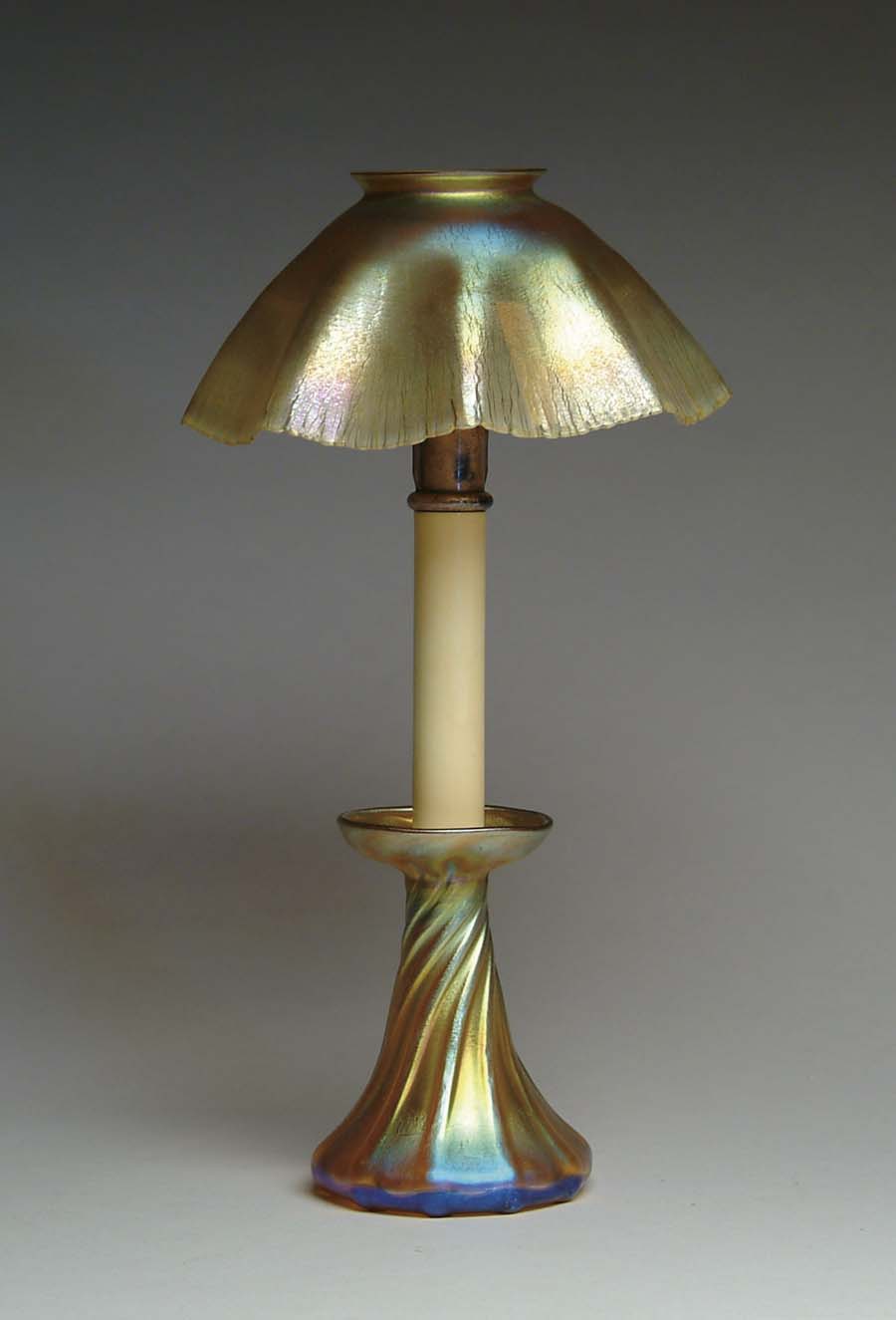 Appraisal: TIFFANY CANDLE LAMP Beautiful Tiffany gold favrile candle lamp has