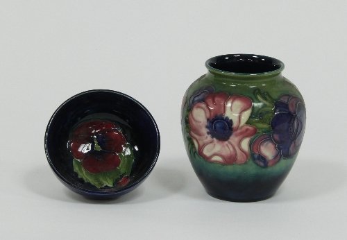 Appraisal: A Moorcroft vase etched and painted anemones cm high and