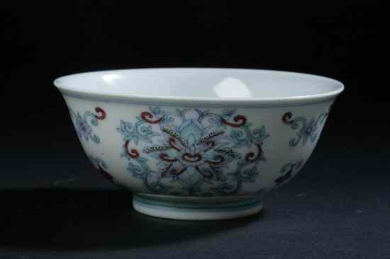 Appraisal: CHINESE DOUCAI PORCELAIN BOWL Qianlong underglazed blue seal mark Floral