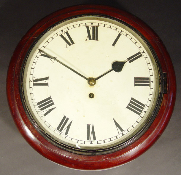 Appraisal: Victorian circular mahogany cased wall clock the dial painted with