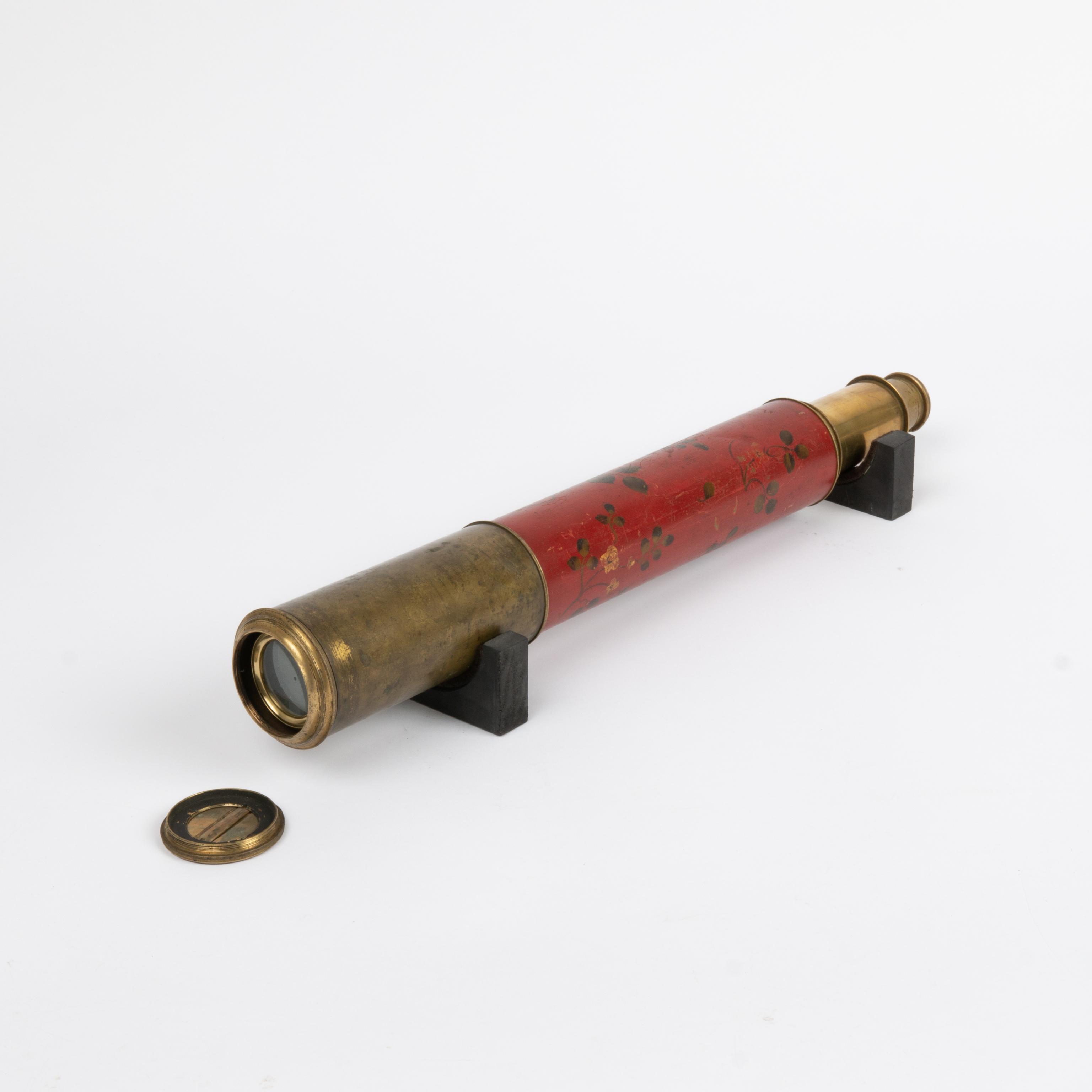 Appraisal: PAINTED LEATHER WRAPPED BRASS TELESCOPE An antique brass hand telescope