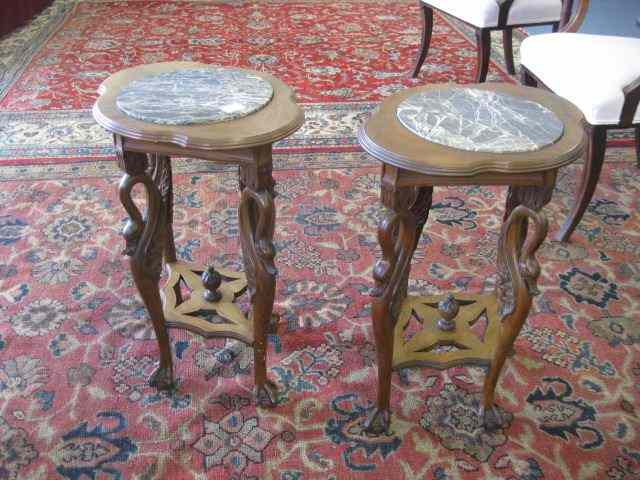 Appraisal: Pair of Italian Side Tables black marbleinsets carved swans on