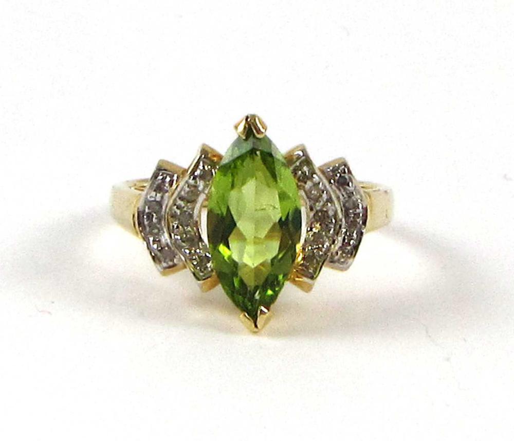 Appraisal: DIAMOND GREEN PERIDOT AND FOURTEEN KARAT GOLD RING a -prong