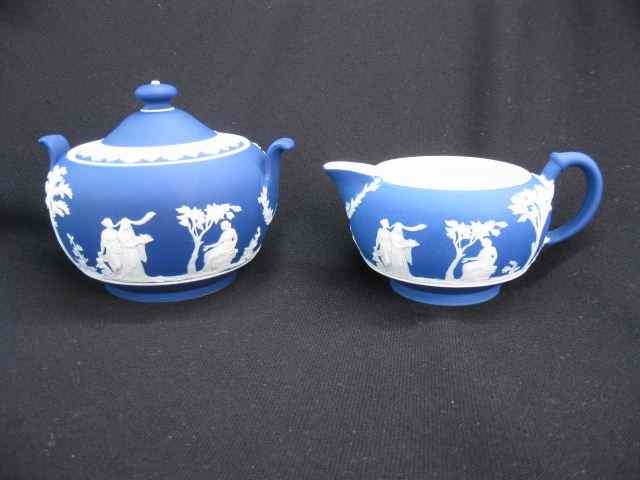 Appraisal: Wedgwood Jasperware Creamer Sugar dark blue classical scenes excellent