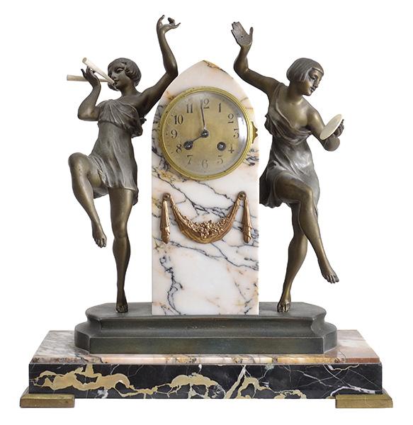 Appraisal: AN ART DECO SPELTER AND IVORY FIGURAL MANTEL CLOCK modelled