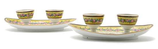 Appraisal: A Pair of Sevres Style Oval Dishes with Fitted Cups