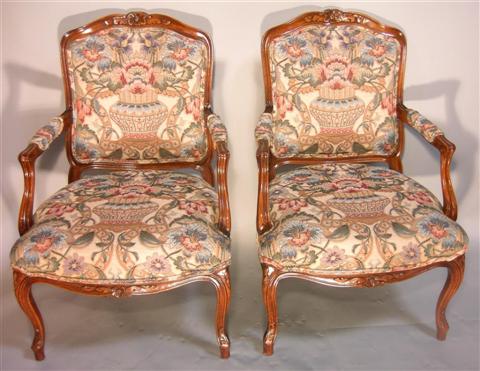 Appraisal: PAIR OF LOUIS XV STYLE FAUTEUILS the shaped crest over