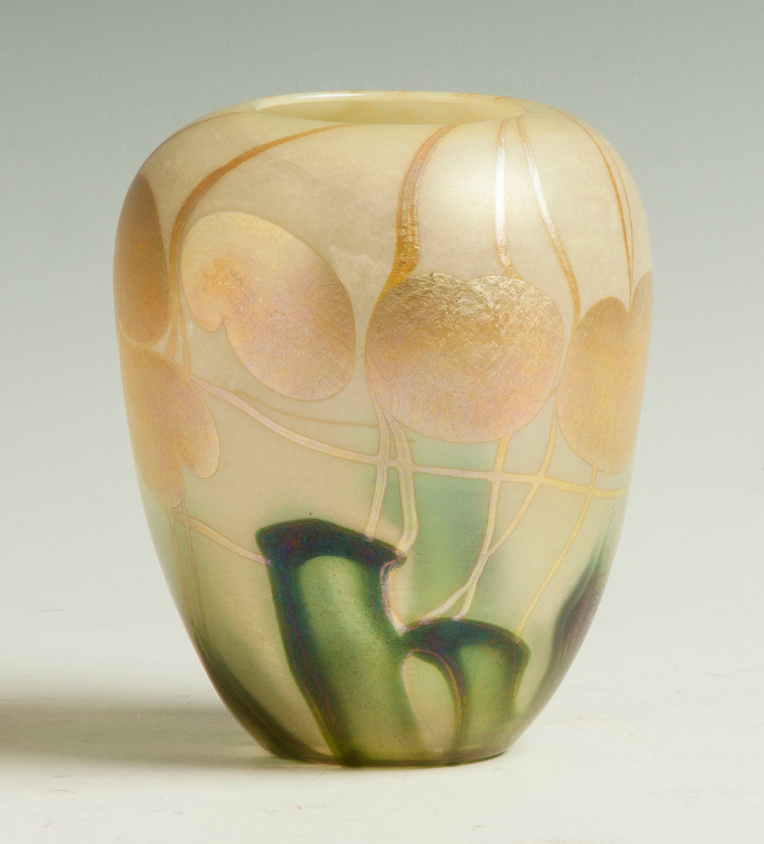 Appraisal: Quezal Vase with Lily Pads Early th cent Sgn Quezal