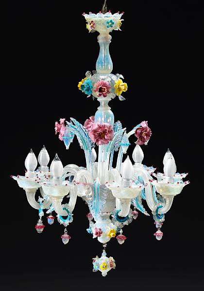 Appraisal: A Venetian Rococo style Murano colored glass eight light chandelier