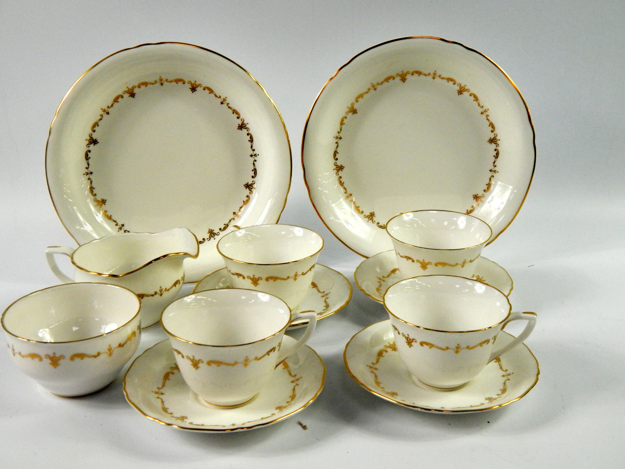 Appraisal: A Royal Worcester porcelain tea service decorated in the gold