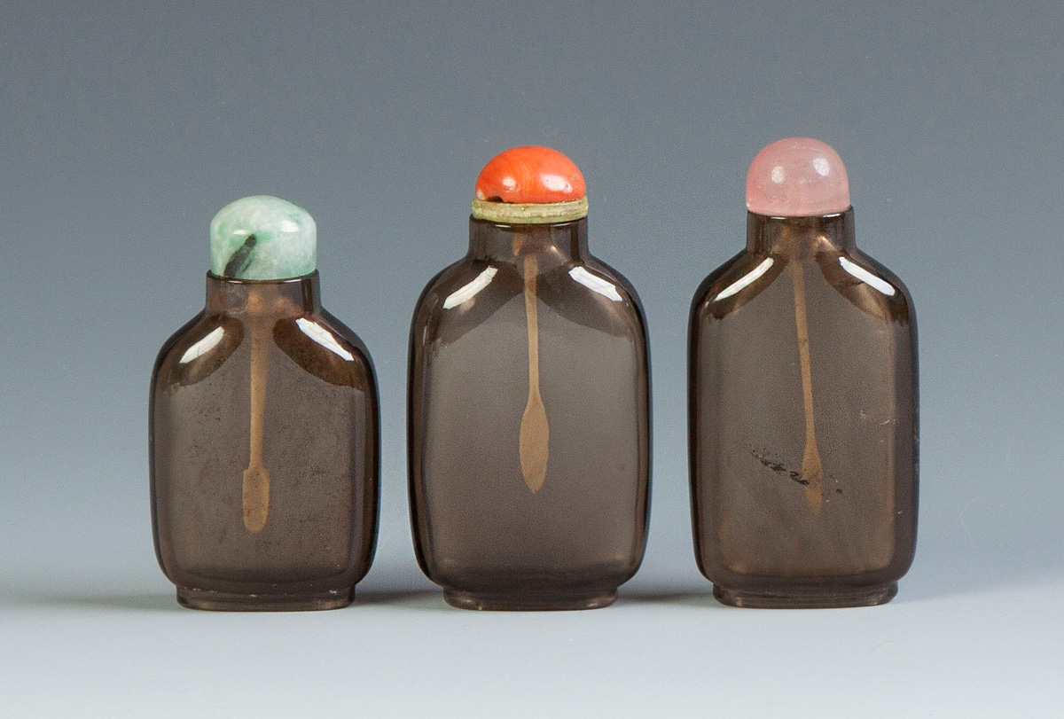 Appraisal: Three Chinese Smoky Quartz Snuff Bottles