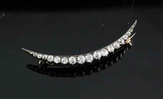 Appraisal: An Edwardian gold and diamond crescent brooch in with original