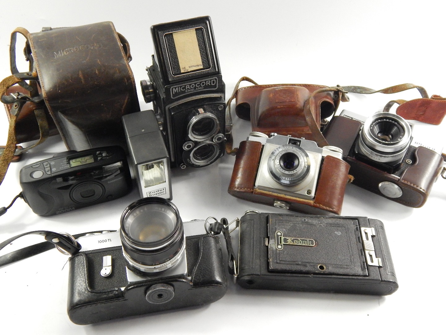 Appraisal: A quantity of cameras comprising a Microcord Rank Mamiya Auto