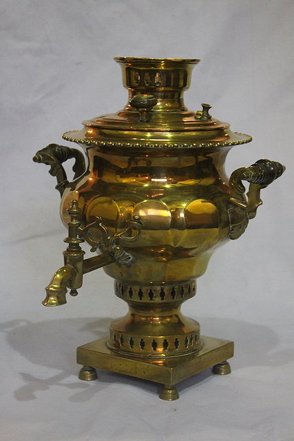 Appraisal: A COPPER TWO HANDLED SAMOVAR