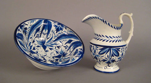 Appraisal: Leeds pitcher and washbowl th c with blue floral decoration