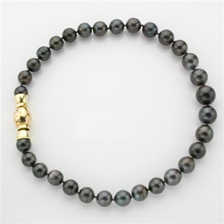 Appraisal: Black Cultured Pearl Necklace with Gold and Diamond Clasp Estimate