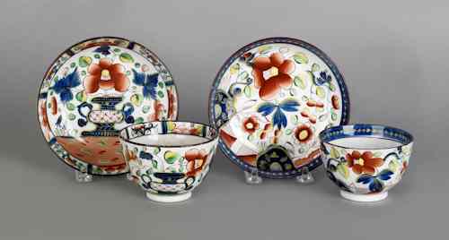 Appraisal: Two Gaudy Dutch cups and saucers th c in the