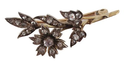 Appraisal: A small foliate brooch set overall with graduated diamonds in