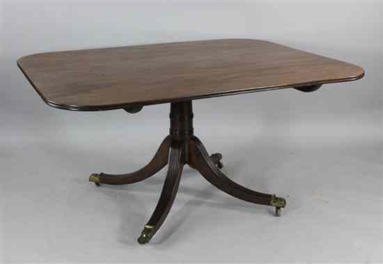 Appraisal: A Regency mahogany breakfast table with rectangular top and reeded