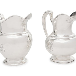 Appraisal: Two American Silver Water Pitchers th Century comprising an example