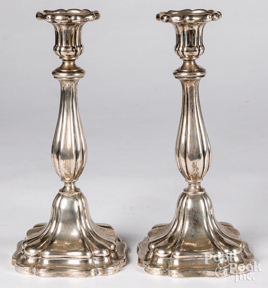 Appraisal: Pair of silver candlesticks Pair of silver candlesticks h ozt