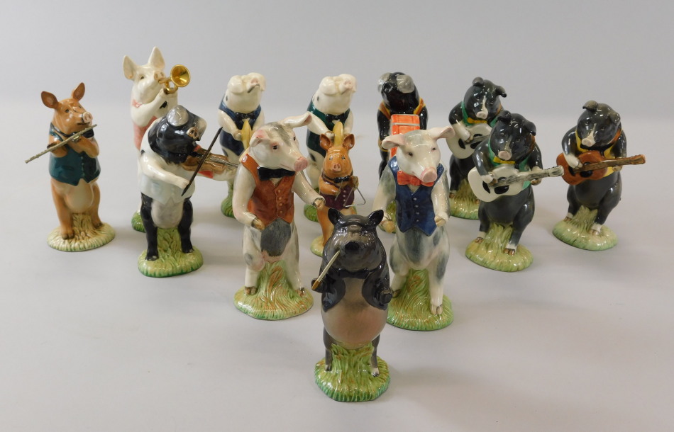 Appraisal: A Beswick pig band to include Andrew PP playing cymbals