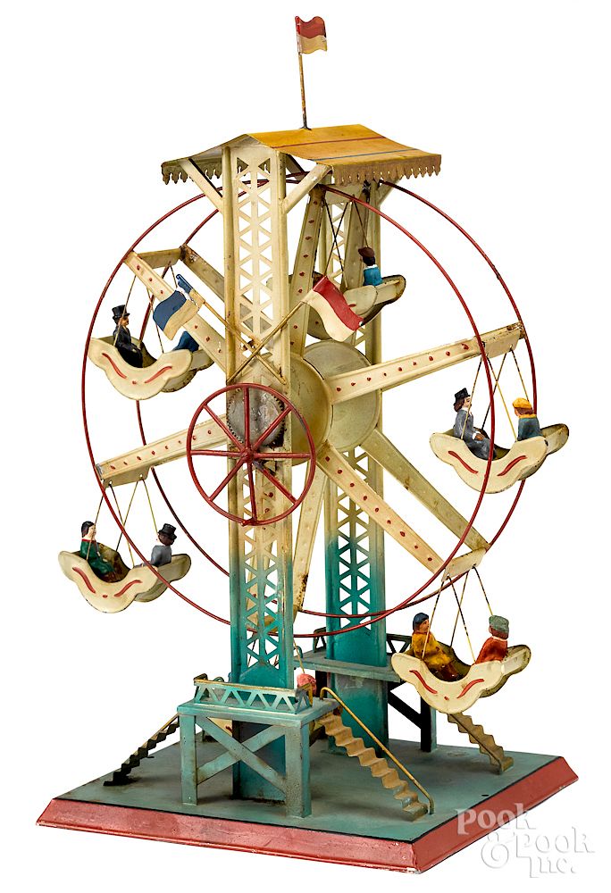 Appraisal: Doll painted tin Ferris wheel steam toy accessory Doll painted