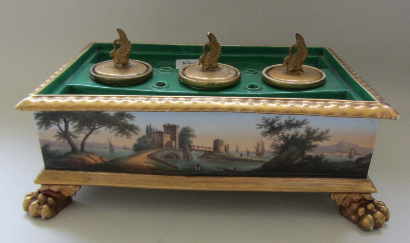 Appraisal: A French porcelain rectangular inkwell deskstand circa the three reservoir