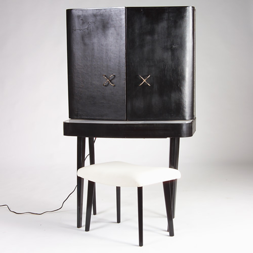 Appraisal: GEORGE NELSON HERMAN MILLER Ebonized vanity with leather-covered door panels