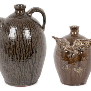 Appraisal: A Pair of Folk Art Pottery Jugs by Dwayne L