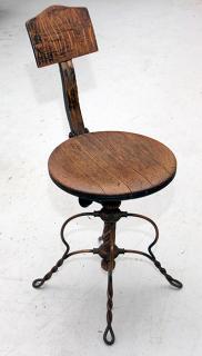 Appraisal: Bookmakers chair an adjustable spring back oak tipplers chair with