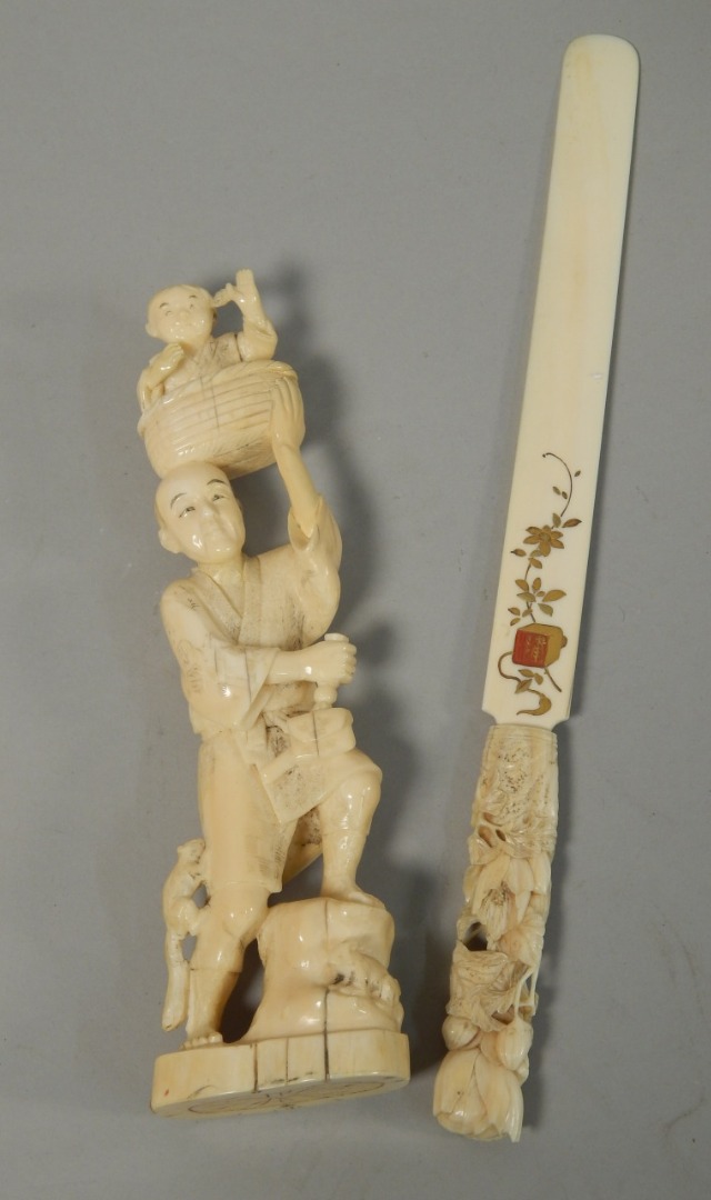 Appraisal: Two items of Meiji period Japanese ivory being an okimono