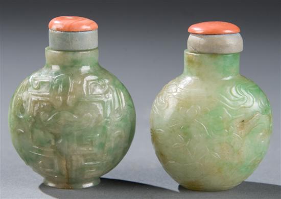 Appraisal: Two Chinese green jade snuff bottles Ovoid form bottle carved