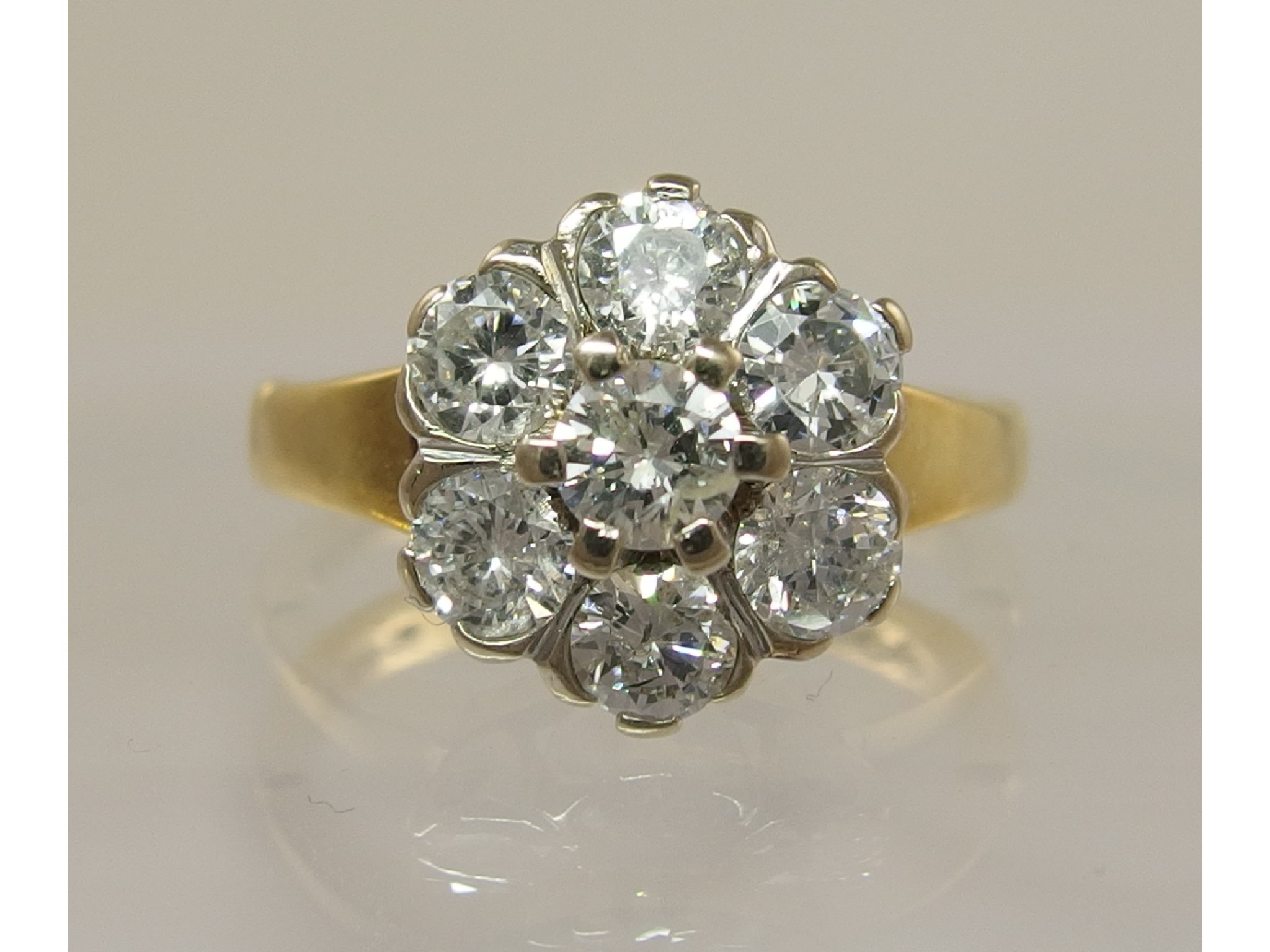 Appraisal: An ct diamond flower ringwith an approximate diamond total of