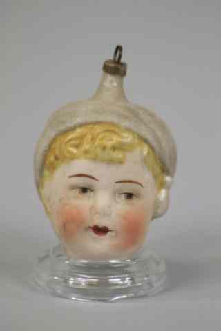 Appraisal: FLAPPER GIRL'S HEAD Germany blown glass flapper girl's head with