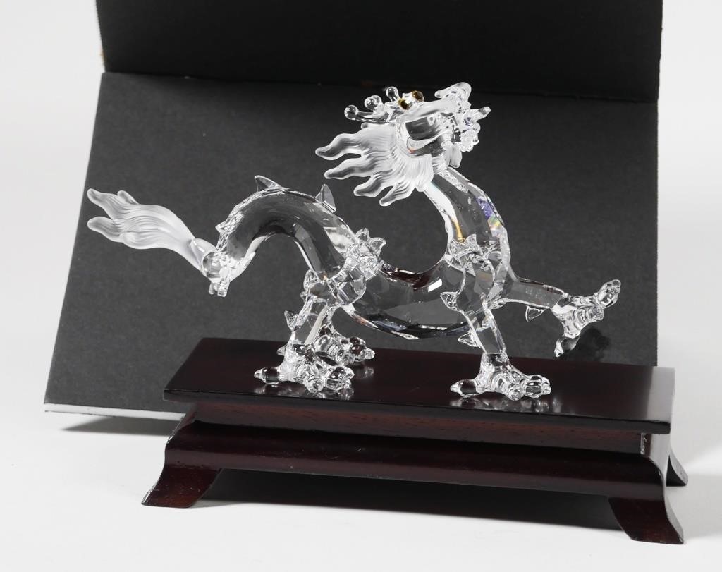 Appraisal: Retired Swarovski Crystal Figurine Dragon with Ball This Swarovski crystal