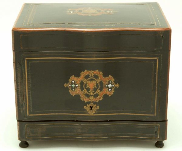 Appraisal: A tantalus box of black lacquered wood with overall line