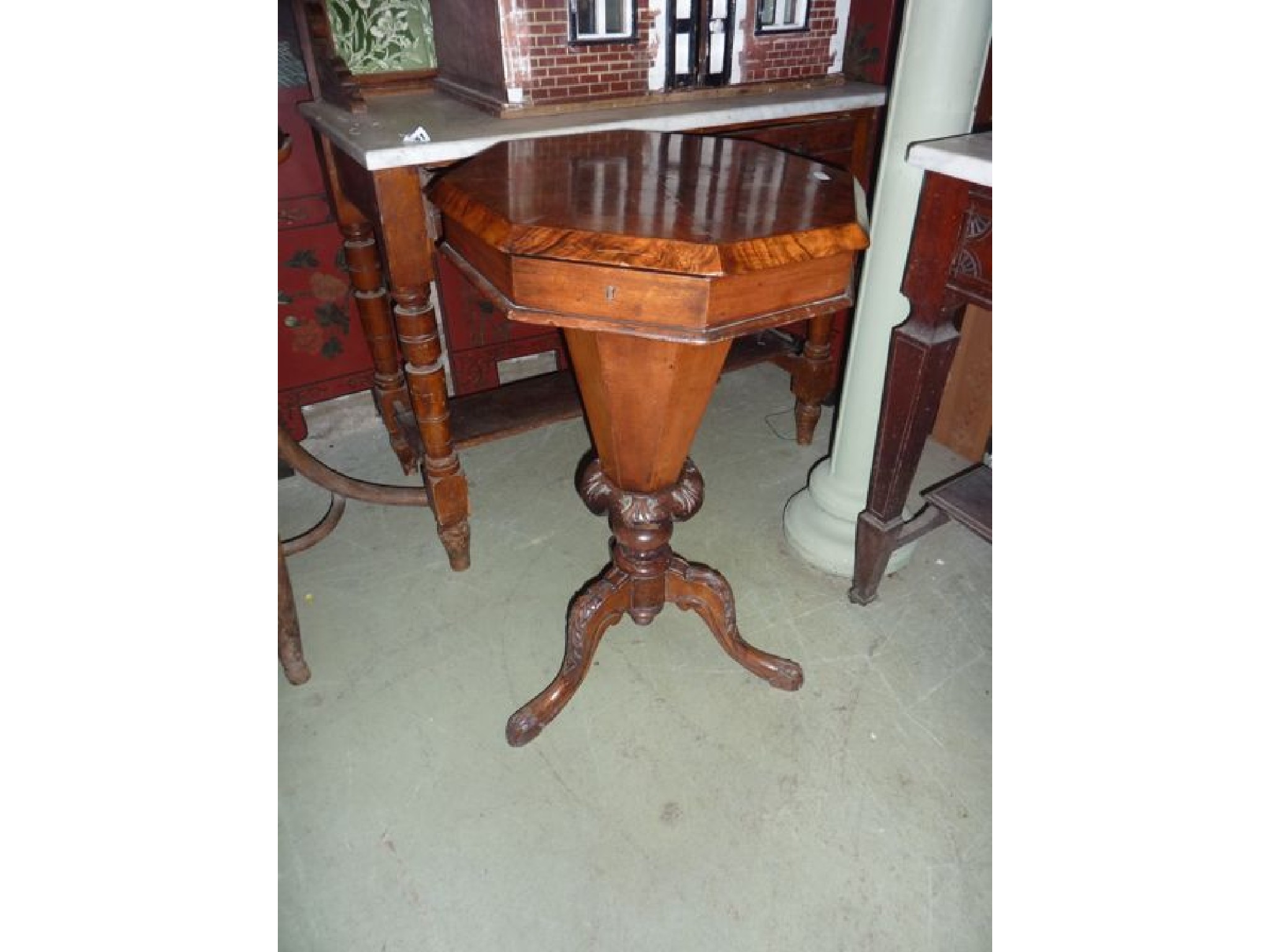 Appraisal: A Victorian walnut trumpet shaped sewing work box of octagonal