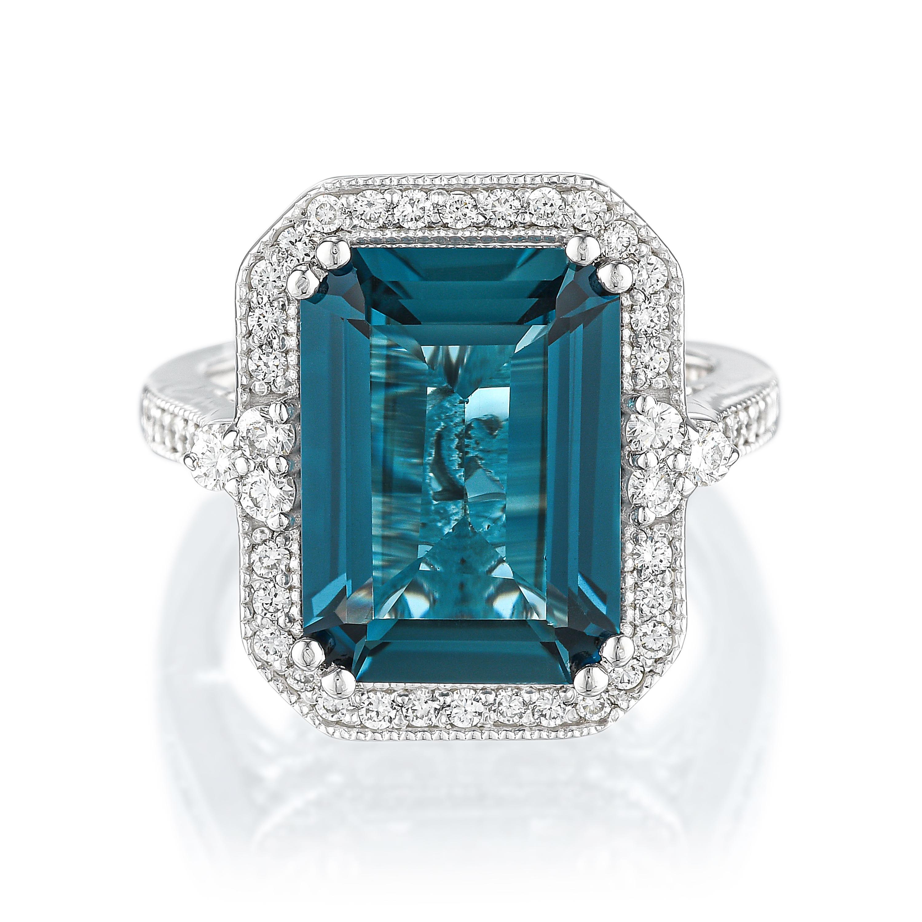 Appraisal: LONDON BLUE TOPAZ AND DIAMOND COCKTAIL RING METAL K white